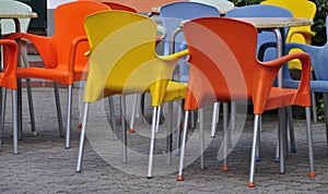 Orange and yellow plastic chairs