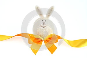 Orange and yellow ribbon with white rabbit