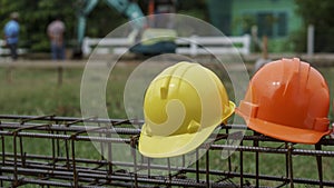 orange and Yellow Safety helmet (hard hat) for engineer, safety officer, or architect.