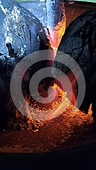 OrangeGlowing Charcoal Rocks that look like cave
