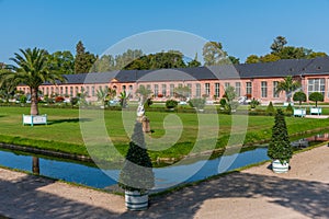 Orangerie and surrounding garden at Schwetzingen palace in Germany during sunny summer day