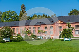 Orangerie and surrounding garden at Schwetzingen palace in Germany during sunny summer day