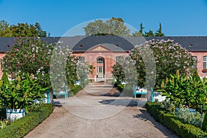 Orangerie and surrounding garden at Schwetzingen palace in Germany during sunny summer day