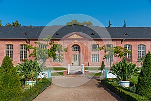 Orangerie and surrounding garden at Schwetzingen palace in Germany during sunny summer day