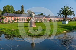 Orangerie and surrounding garden at Schwetzingen palace in Germany during sunny summer day