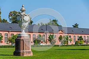 Orangerie and surrounding garden at Schwetzingen palace in Germany during sunny summer day