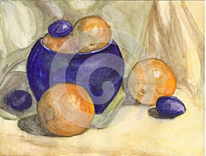 Oranges in a blue vase