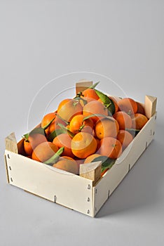 Oranges crate on white