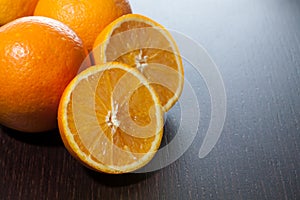 Oranges on dark background