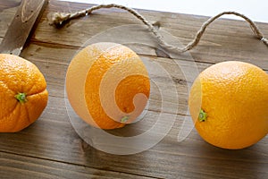 Oranges freshly picked off the three ready to be eaten on the kitchen table.