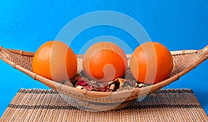 Oranges fruits on blue background