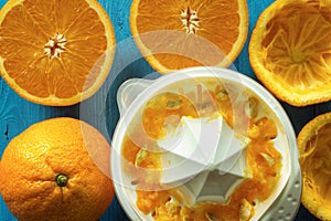 Oranges with juicer