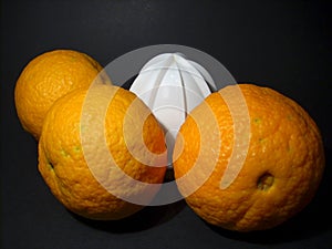 Oranges and juicer