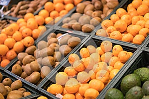 Oranges and Kiwis on fruit market