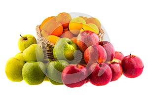Oranges and lemons, red and green apples in a wooden basket