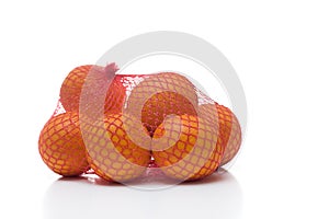 Oranges in netting photo