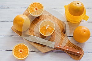 Oranges, orange juice and slices of fruit photo