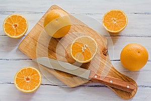 Oranges, orange juice and slices of fruit photo