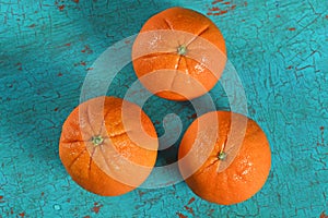 Oranges Over Vintage Table