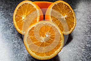 Oranges with peel in a heap