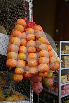 Oranges at a small Quitp market, Quito, Ecuador photo