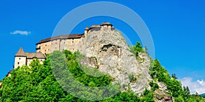 Orava Castle, green trees with blue sky, Slovakia