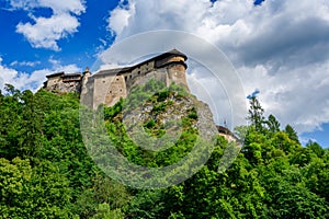 Orava Castle, a well-preserved building located on the Orava River, built on a rocky hill. A popular tourist attraction