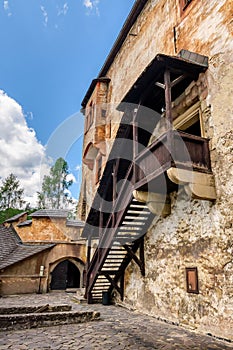 Orava Castle, a well-preserved building located on the Orava River, built on a rocky hill. A popular tourist attraction