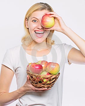 Orchard, gardener girl with apple basket. autumn harvest. Spring seasonal fruit. farming green life. healthy food