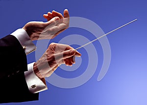 Orchestra conductor hands photo