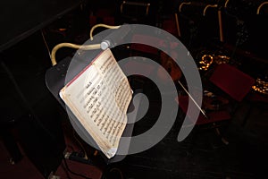 orchestra music stand with notes