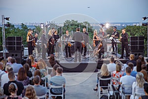 Orchestra performing live concert on the street