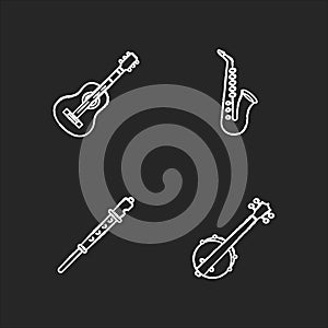 Orchestral musical instruments chalk white icons set on black background