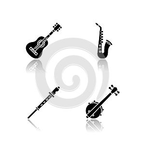 Orchestral musical instruments drop shadow black glyph icons set photo