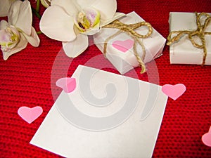 Orchid and hearts on red cloth, Valentines Day background, wedding day