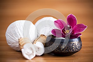 Orchid and massage compresses