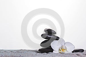 Orchid stones grey towel . High quality and resolution beautiful photo concept