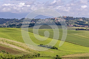 The Orciano Pisano countryside with Lorenzana in the background, on a sunny spring day, Pisa, Italy photo