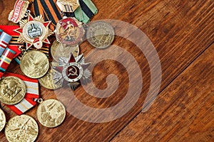 Order of the Patriotic War in St. and Medals for the victory over Germany on a table. close up