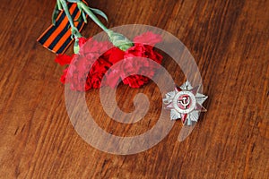 Order of the Patriotic War in St. and two red flower and George ribbon