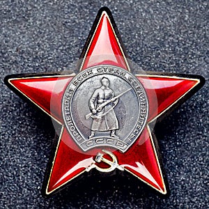 Order Red Star on a granite background
