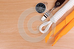 Orderliness white scout rope, scarf, whistle and compass. photo