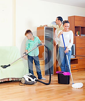 Ordinary family doing cleaning