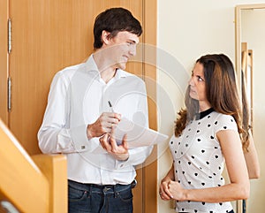 Ordinary social worker questioning woman