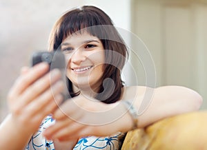Ordinary woman using electronic device