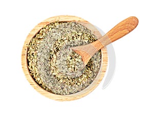 Oregano in wooden spoon and bowl isolated on white background