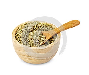 Oregano in wooden spoon and bowl isolated on white background ,include clipping path