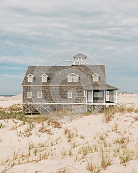 Oregon Inlet Lifesaving Station with sandy dunes, in the Outer Banks, North Carolina