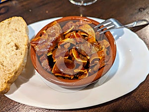 Oreja en salsa tapa, typical in Spain photo
