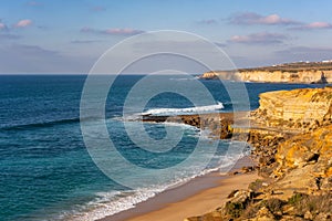 Orelheira beach on a sunny day in Ericeira, Portugal